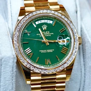 Rolex Day-Date 40 Yellow Gold Green Dial Baguette Bezel