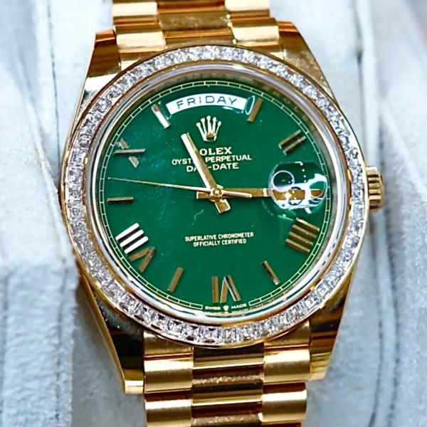 Rolex Day-Date 40 Yellow Gold Green Dial Baguette Bezel