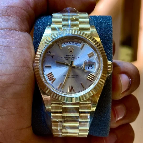 Rolex Day-Date 40 Yellow Gold Silver Roman Dial